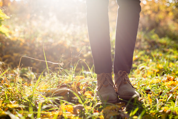 Person stepping out into the outdoors 