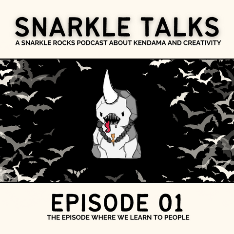 snarkle talks episode 01 cover page. it has an illustration of a pale creature with a big horn on its head. it's wearing a kendama necklace. the figure is on a black background and surrounded by bats.