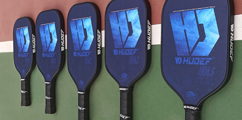 pickleball paddles on a court