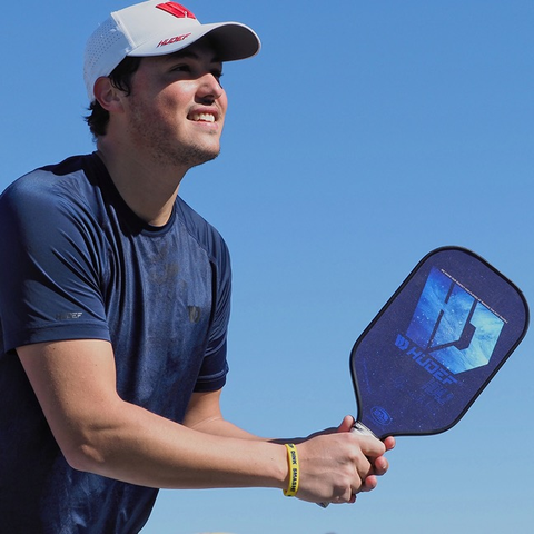 player playing with new pickleball paddle