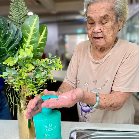 A Senior trying out Suu Balm Cream Body Wash