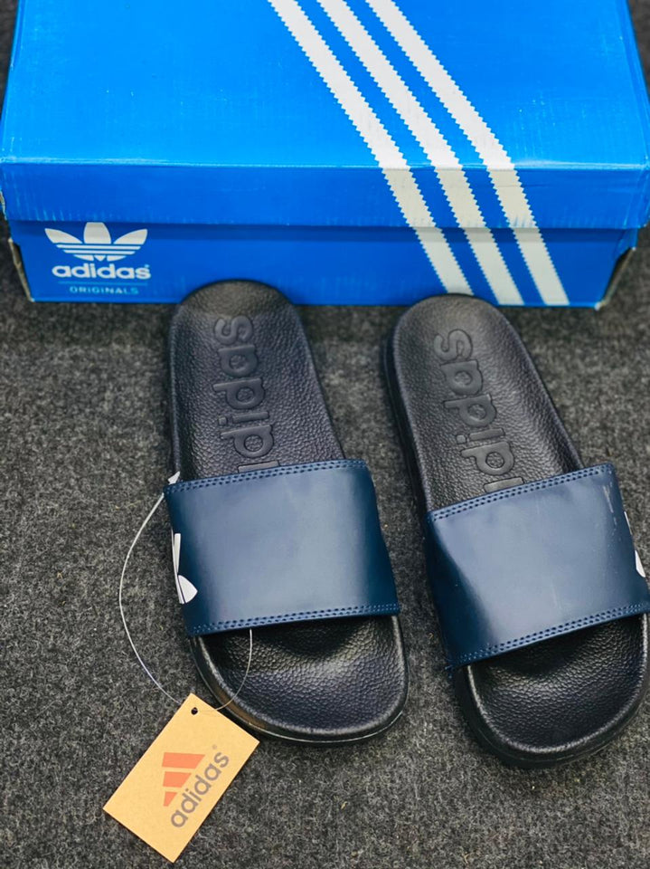 sky blue adidas slides