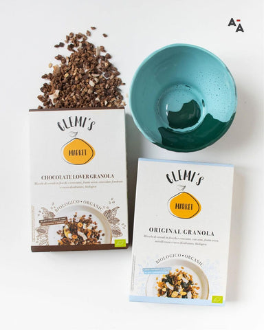 Original Granola and Chocolate Lover Granola with a handmade ceramic bowl