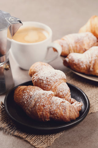 Croissants with cup of coffee and mocha