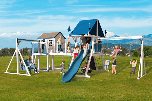 A group of children playing on an Innovative Playtime playset. 