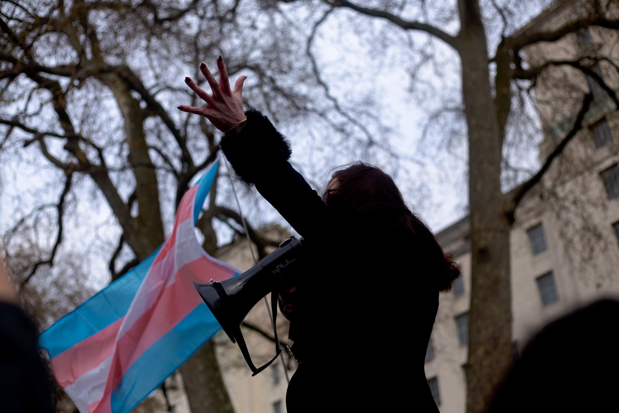 Activist with a megaphone at The Trans Rights Protest London, April 2022 - Photo by Karollyne Hubert