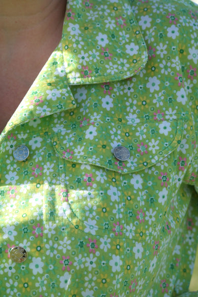 Close up of top-stitching, pocket & collar