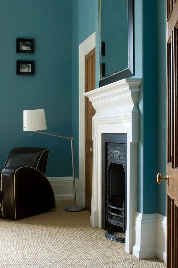A bedroom painted in Pitch Blue No.220 by Farrow & Ball - Eclectic