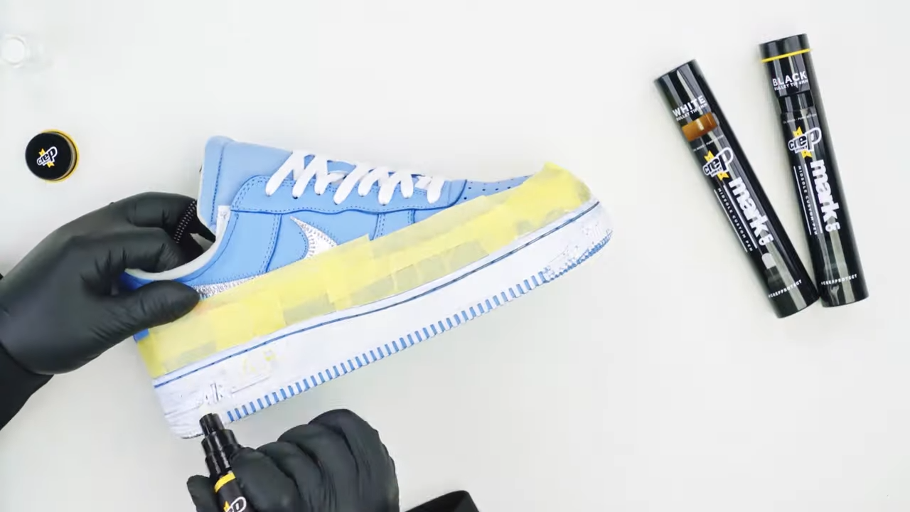 Applying an extra layer to the Off-White Air Force 1s
