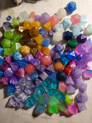 Pile of a bunch of dice in multiple colors