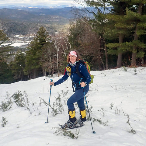 Snowshoer at the top of Hickory