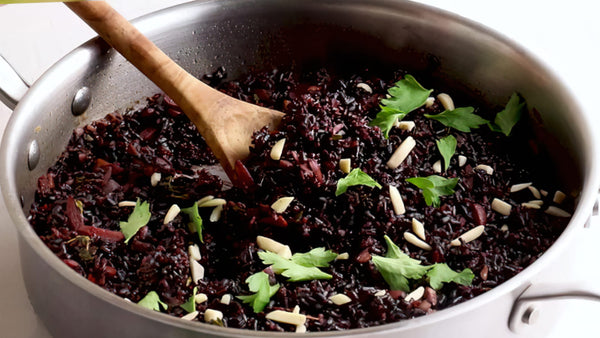 Forbidden black rice in a Pan with Spoon