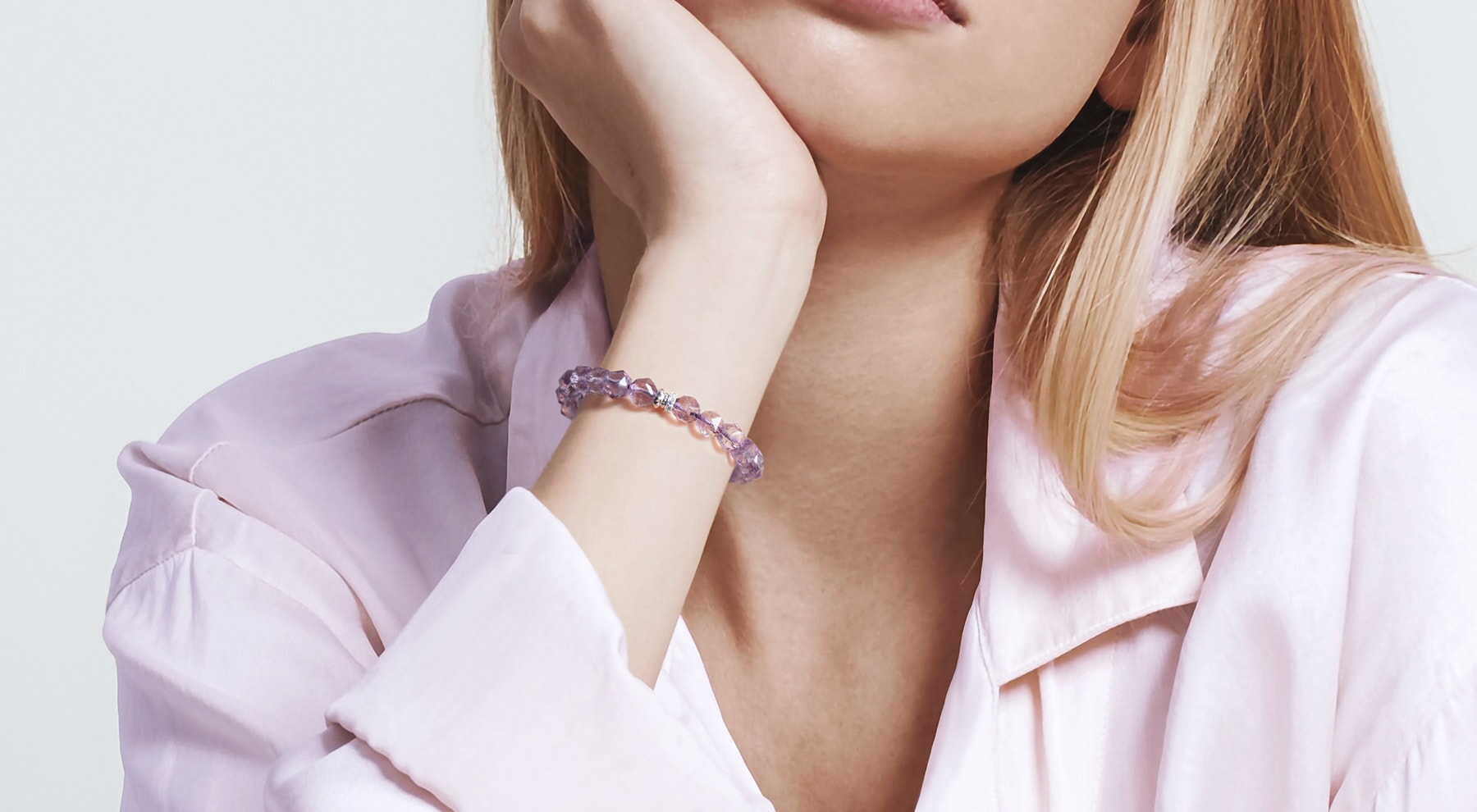 wearing AWNL amethyst gemstone bracelet