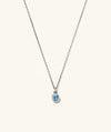 Sia Birthstone Pendant Necklace featuring a sparkling gemstone on a silver chain, perfect for personalizing with your zodiac sign or gifting.