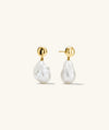 Harley Baroque Pearl Earrings featuring oversized baroque pearls with a pebbled texture, evoking a beachy essence and fresh attitude.