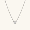 Diamond Necklace: A 14k solid gold chain with a round cut, bezel-set, responsibly sourced diamond pendant.