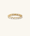 Aurora Radiant Eternity Ring with radiant cut lab-grown sapphires in prong settings, showcasing a seamless row that brilliantly catches light.