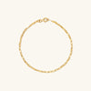 Anchor Chain Anklet: 14k solid gold chain with interlinked design, resembling a ship's anchor chain, displayed on a plain white background.