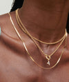 Curb Chain Necklace worn by a woman, showcased in a close-up. Handcrafted in 14k solid gold, ideal for daily wear and layering with longer necklaces.