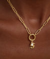 Lab Grown Diamond Pear Bezel Pendant on a gold chain, featuring a close-up of the diamond in a bezel setting.