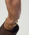 Close-up of a person wearing the Mejuri Custom Chain Bracelet, showcasing its unique, customizable design, perfect for adding charms and personal touches.