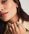 Close-up of a woman's hand wearing the Puffy Charlotte Enamel Ring, part of the Charlotte Collection, showcasing its bold sterling silver design and enamel detailing.