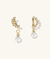 Remy Gemstone Pearl Charm Hoops featuring gold earrings with diamonds and removable pearls, offering versatile styling options with a mix-and-match charm design.