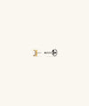 Mini Baguette Stud earring featuring a close-up of a baguette-cut diamond, designed to lie flat against the ear for comfort.