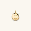 Gold Zodiac Charm Pendant featuring a circular medallion with an attached ring, designed to honor all 12 astrological signs.