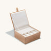 Jewelry box with an open lid, featuring three removable trays and compartments for organizing jewelry.