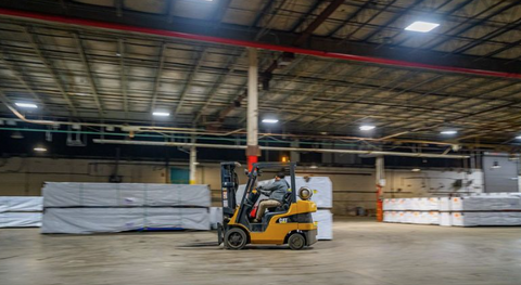 Forklift in warehouse