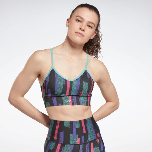 Reebok Women's Prime Essential Medium Impact Sports Bra with Back Pocket  and Removable Cups (Bittersweet-S) at  Women's Clothing store