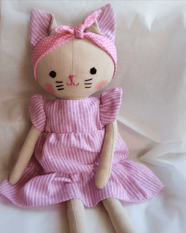 handmade cat doll made using the studio seren cat sewing pattern