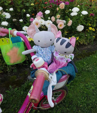 handmade dolls in a bike