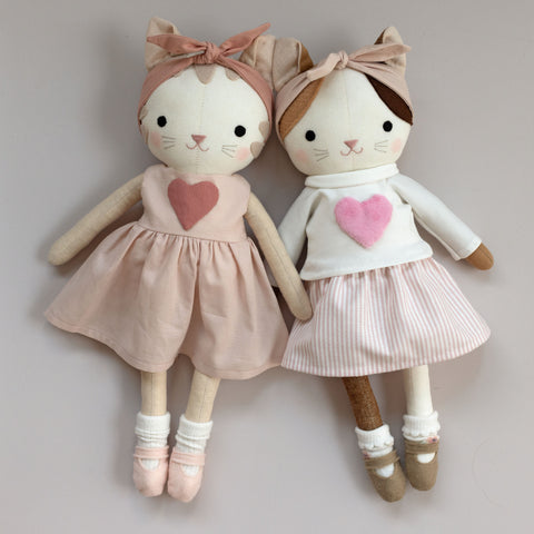 handmade cat dolls wearing valentine outfits made with studio seren doll sewing patterns