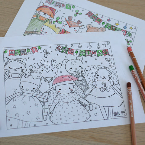 christmas colouring sheet containing pictures of studio seren dolls dressed in christmas clothes