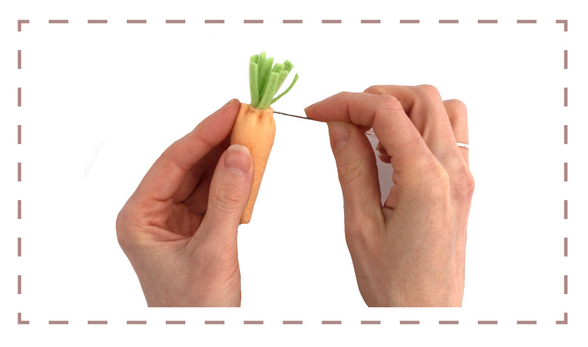 felt carrot sewing pattern - sewing the leaves into place