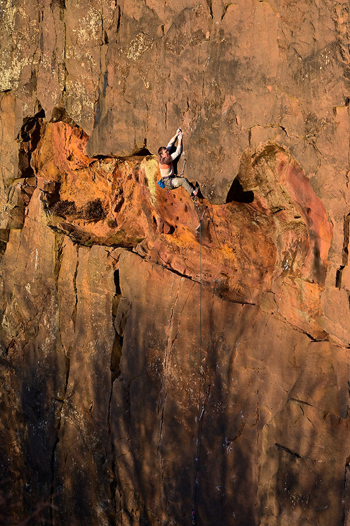 Bransby leading the headwall above the cave and which could be climbed as a pitch in its own right. © Ray Wood