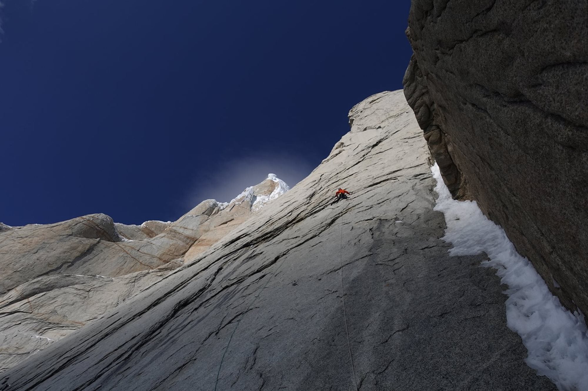 The sweeping granite of <em>Marc-André’s Visión</em> (950m, 5.12b) on the East Pillar of Torre Egger, Patagonia. © Brette Harrington