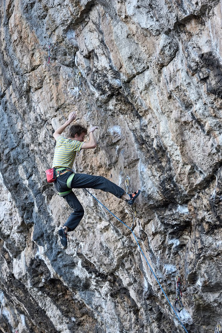 Oli mid-flight on an attempt of Liquid Ambar (8c+) © Ray Wood