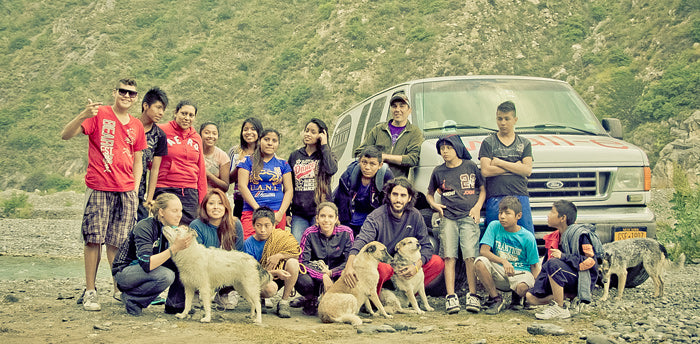 The Wall-E van and local youths near Monterrey. © Gaz Leah