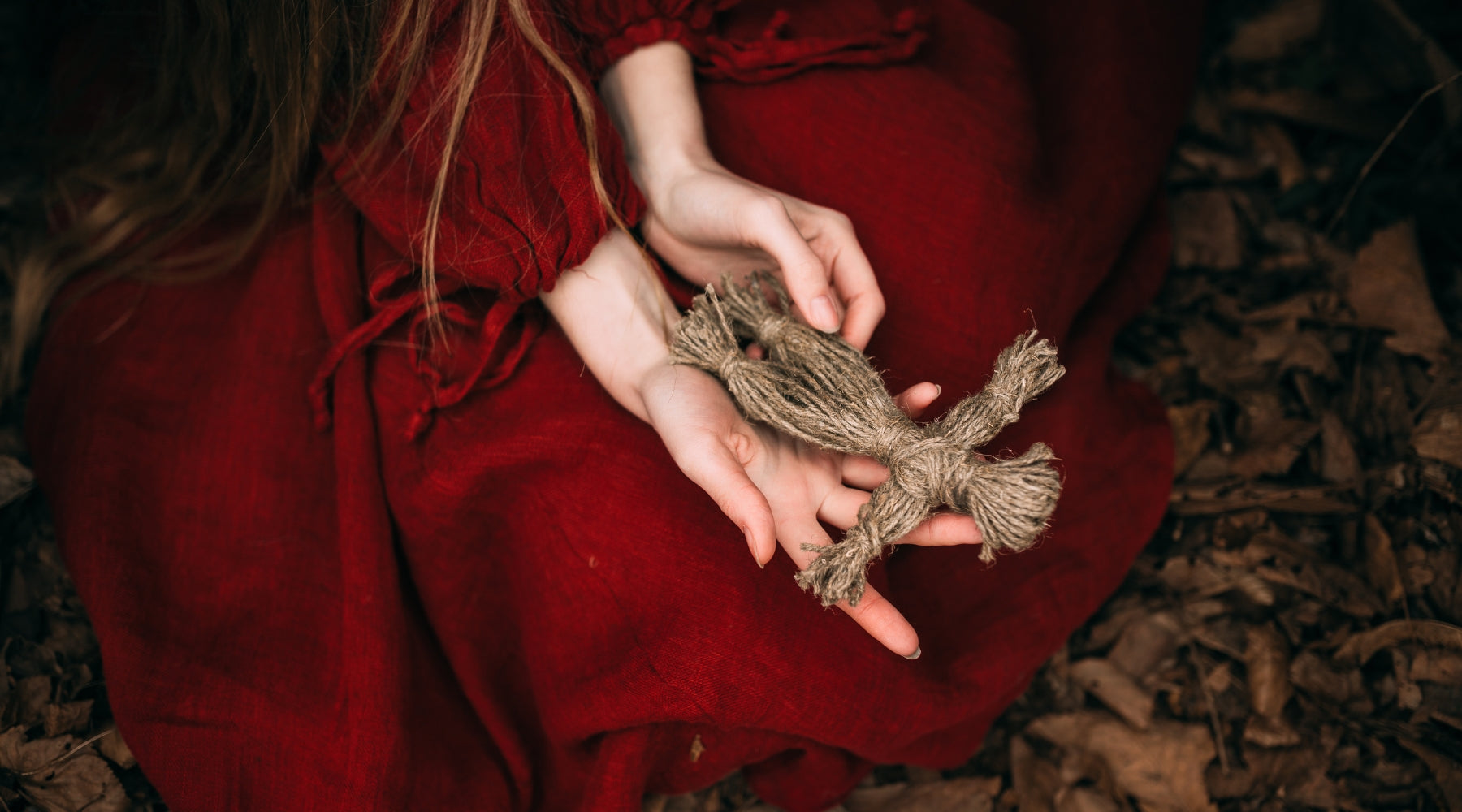 Witch holding straw 