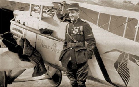 George Guynmer standing beside his Spad plane