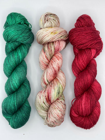 Emerald City, Country Christmas, Ruby Slippers yarn skein pairing suggestion by Red Door Fibers