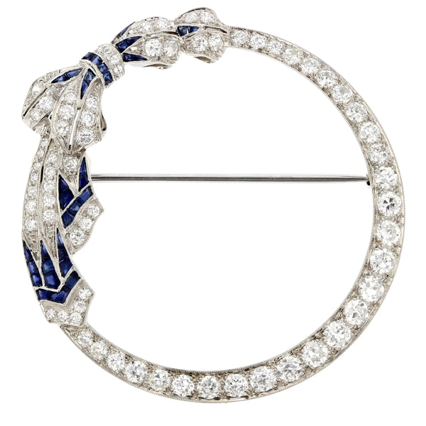 Blue gemstone and diamond brooch