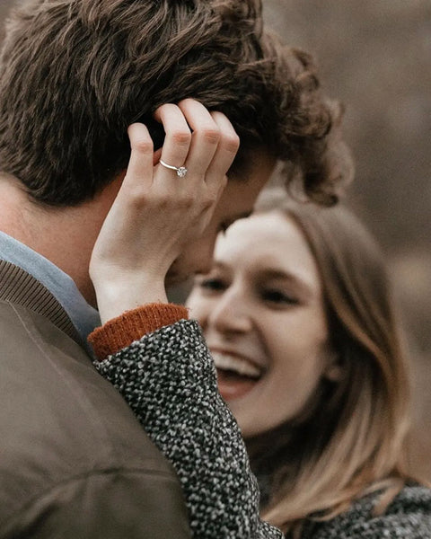 Diamond ring on hand of lady after proposal