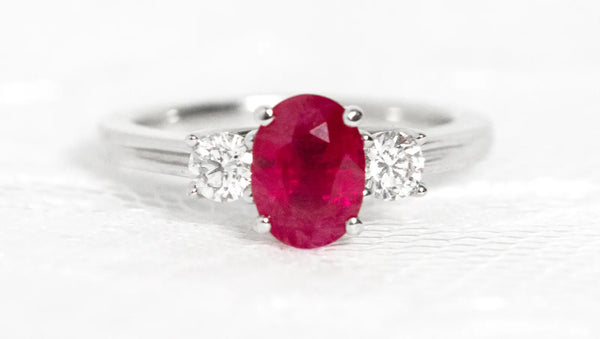 Red gemstone and diamond ring