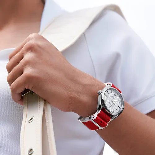Ladies sports watch and white sweater