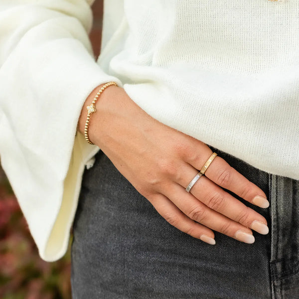 Star bracelet and two skinny wedding bands