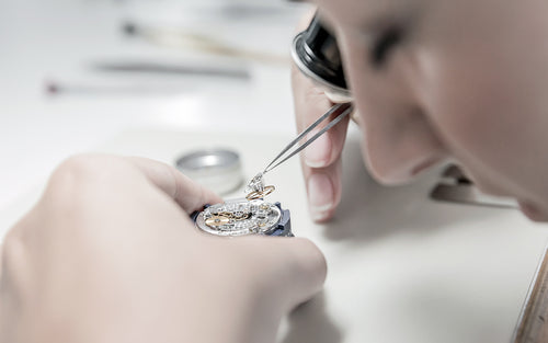 Rolex Watchmaker Assembling a Watch